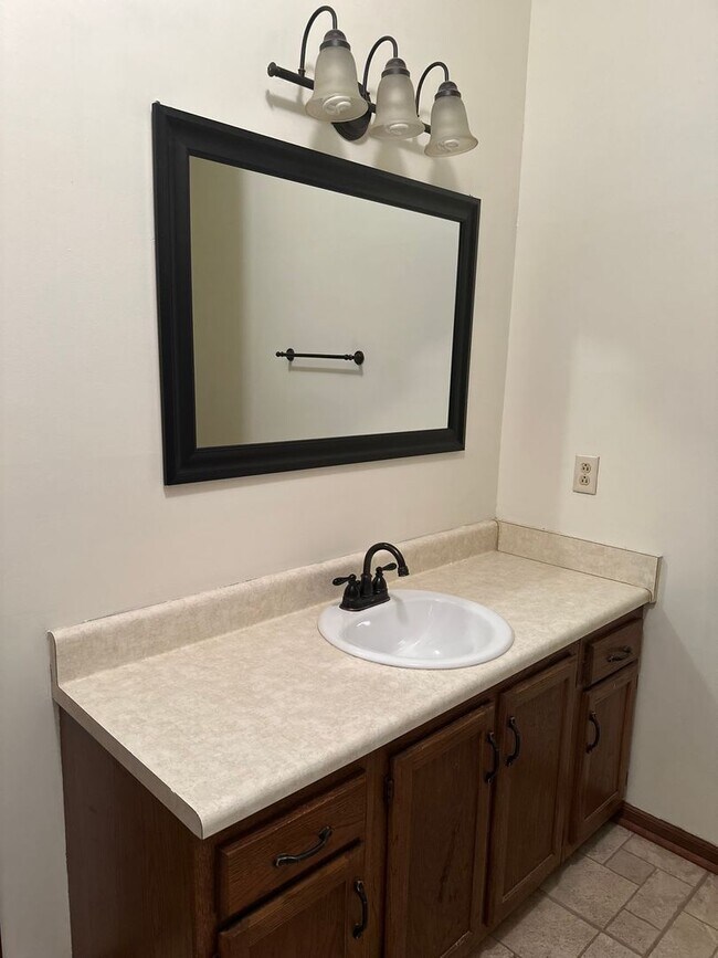 Photo - 3 bedroom 2 and 1/2 bath 2 story uniquely ...