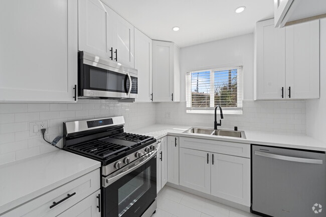 2 habitaciones, 2 baños - 900 pies cuadrados - Palm Gardens Apartments