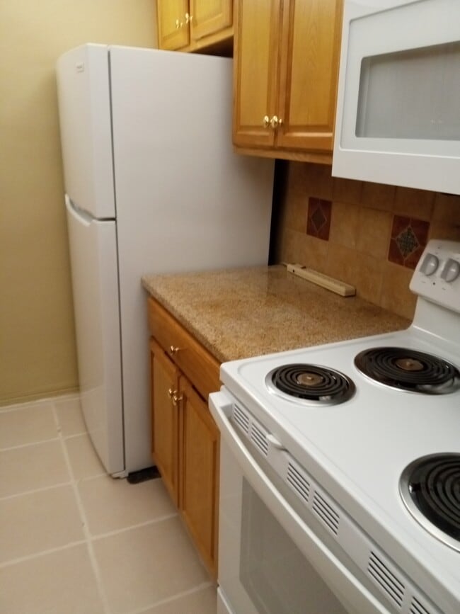 Building Photo - 11251 80th Ave Unit 205