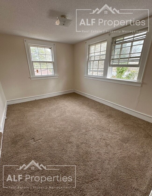 Photo - 3BR/2BA | Two Stories | Large Living Room & Dining Room