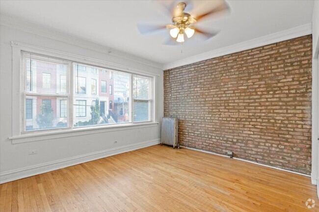 Building Photo - Updated two bedroom w. exposed brick and -... Unit 1 Rental