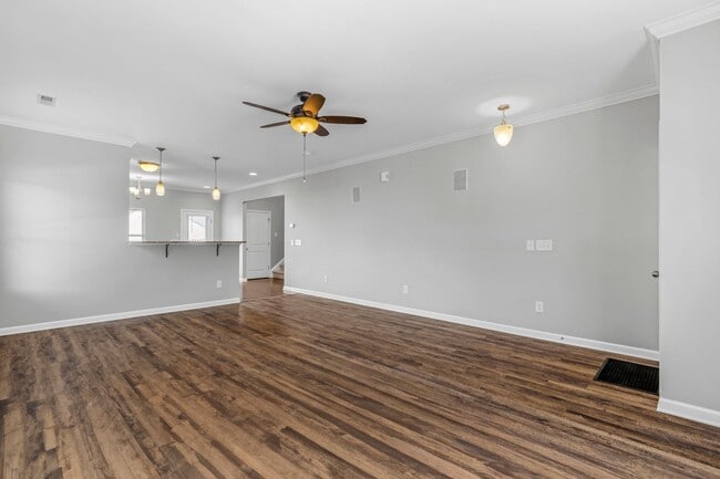 Photo - Newer Home, Granite Counter-Tops, Wood Laminate Flooring, SS Appliances, Garage, Fenced, Must See!