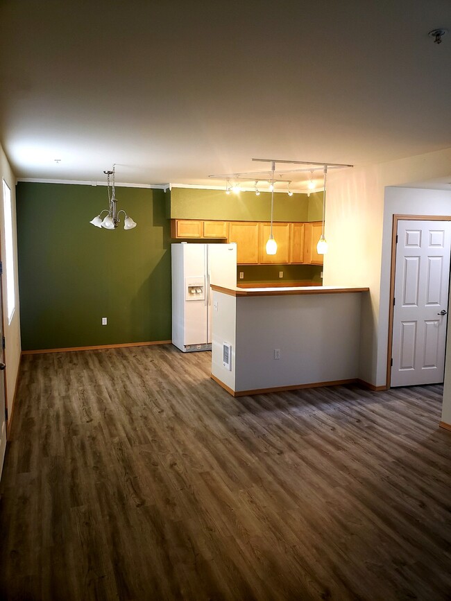 Kitchen will be painted light gray prior to move in date. - 10011 186th St E Condo Unit Waterford Crossings