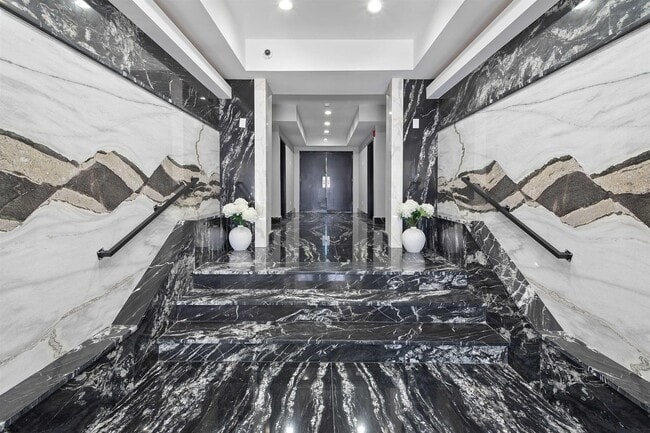 Building Photo - 5311 Atlantic Ave Unit 303