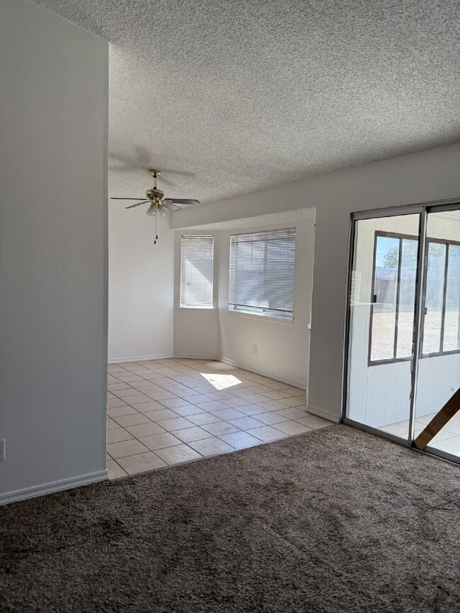Photo - Newly painted throughout, new garage door ...