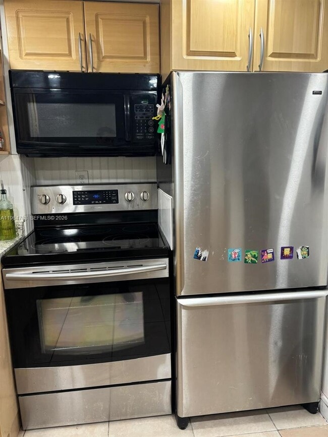 Building Photo - 9365 Fontainebleau Blvd Unit E105