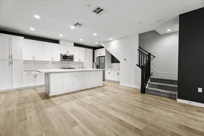 Photo - Modern 3-Bedroom Townhome with Luxe Finishes and Private Garage