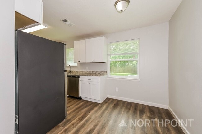 Photo - 3 BR/1BA | Newly Renovated Single Family Home | 1-Car Covered Parking | Gated backyard