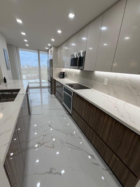 Building Photo - 19707 Turnberry Way Unit 20L