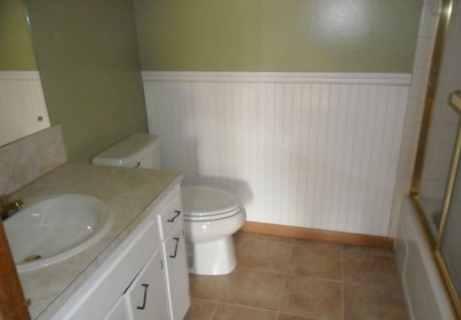 Photo - Spacious 4-Bed Tri-Level with 4-Car Garage — Walk to Elementary, Middle & High School