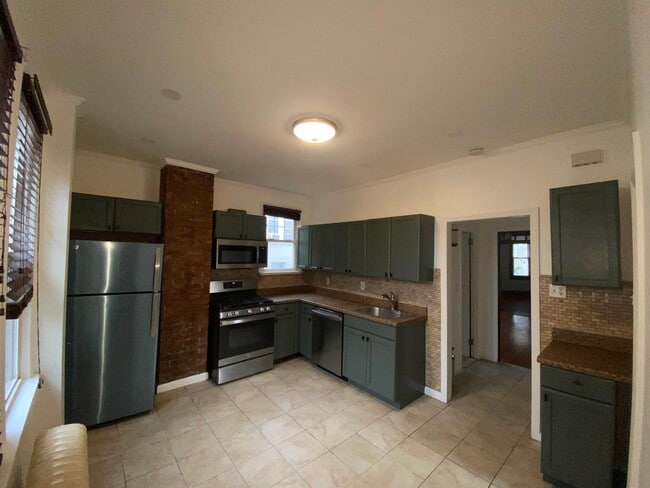 Building Photo - 1142 89th St Unit 2