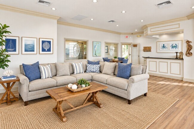 Step into the inviting living area of Manatee Bay, where comfort meets style. Bright, airy interiors and modern furnishings create the perfect setting for relaxation. Ready to elevate your lifestyle? Explore your new home today!