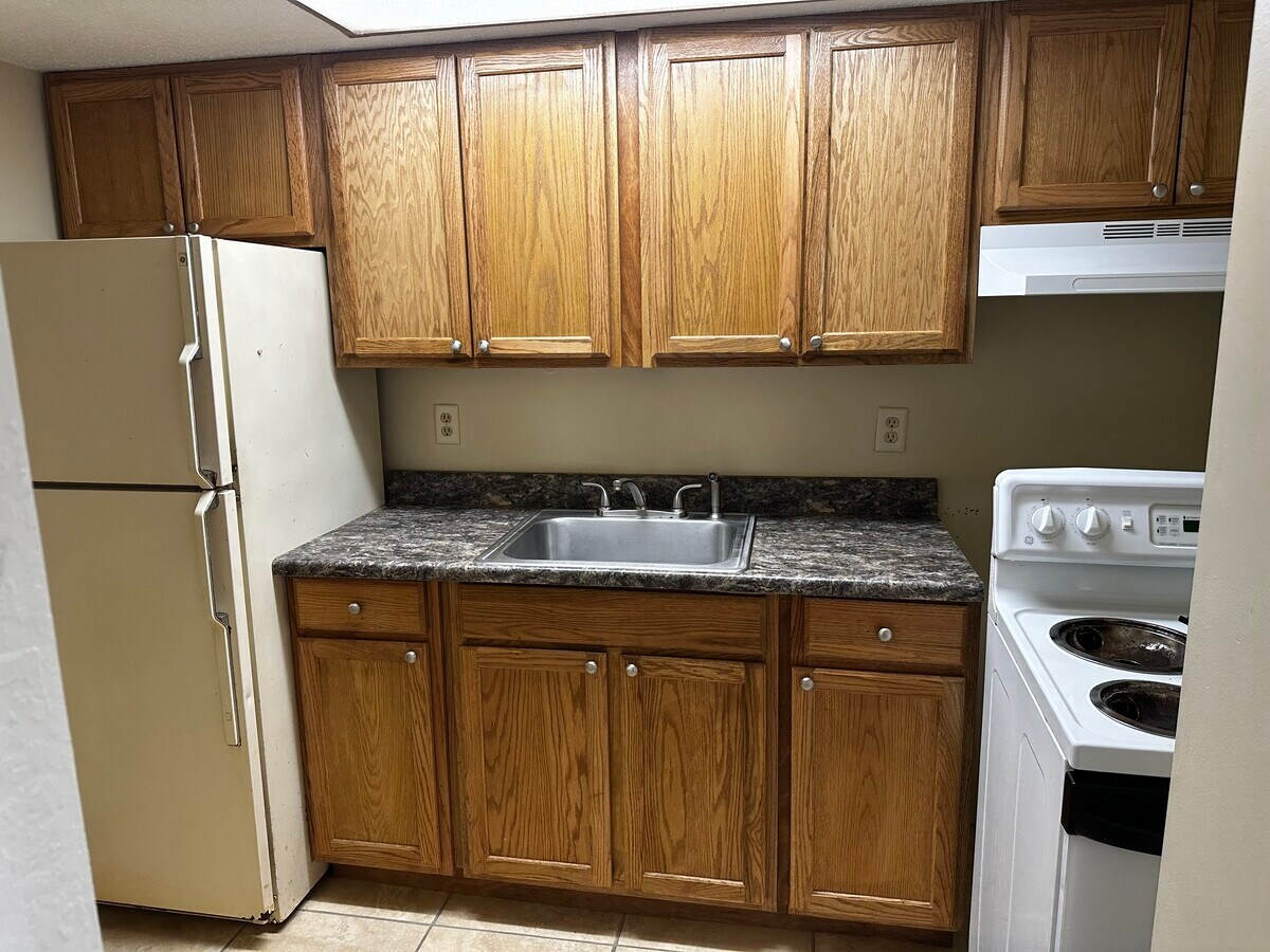 Kitchen...new cabinets, countertop, tile floot - 112 S 7th St Unit 13