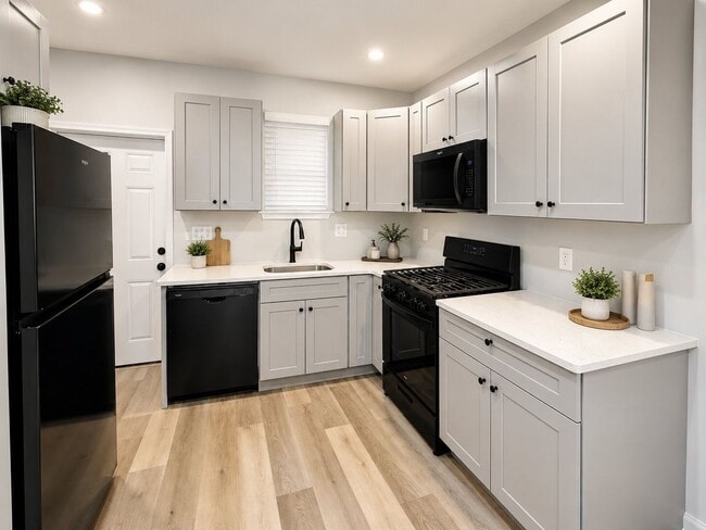 Photo - Spacious 3BR Rental with Central Air & Private Yard