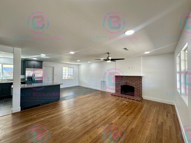 Photo - Modern 3-Bed Home with Fireplace, Backyard Entertaining Space & Prime Location