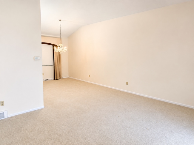 Photo - Spacious 3-Bedroom Split-Level with Formal Dining Room, Fireplace, and Fenced Backyard