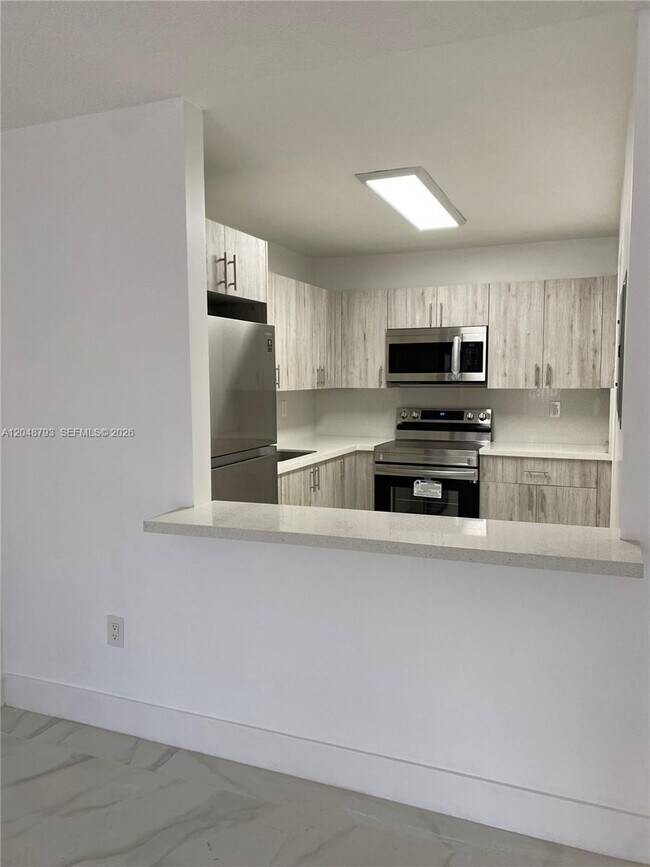 6190 W 19th Ave Unit 206