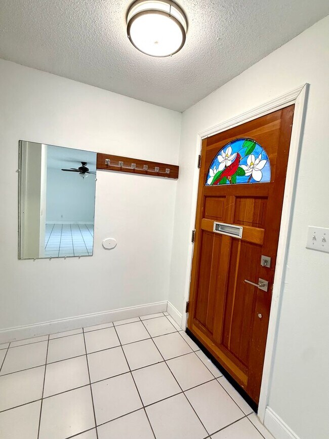 Photo - Beautifully Renovated 4-Bedroom Home with Large Backyard & 2-Car Garage