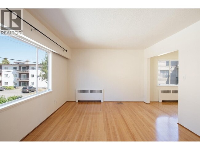 Photo - 1339-1371 W 71st Ave Unité 4