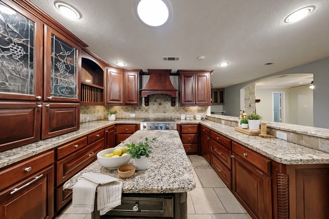 Photo - Spacious 4BR Home in Denton | Fireplace, Fenced Yard, Covered Patio + Near UNT