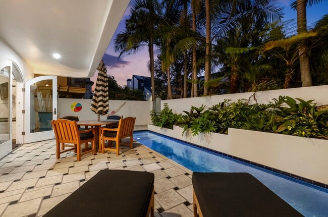 Heated, saltwater lap pool with resistance swim jets for exercise. - 120 Mast Mall