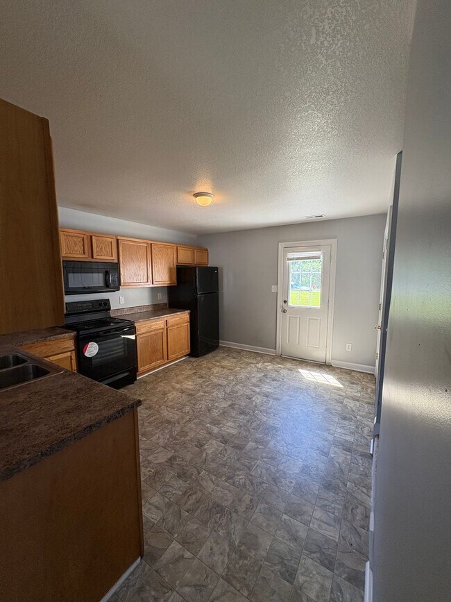 Photo - Charming two bedroom one and a half bath town home that is centrally located. Just a short drive ...