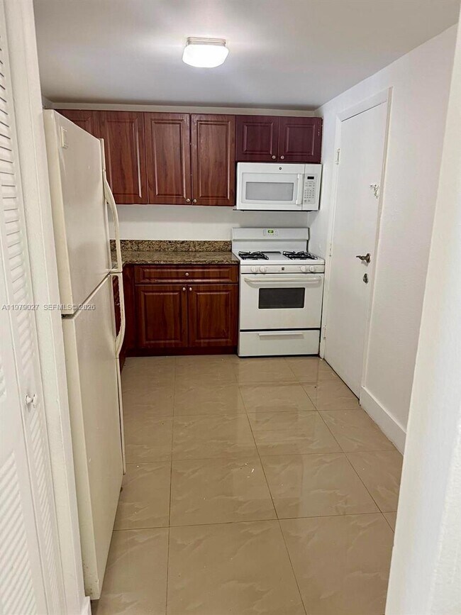 Building Photo - 17911 NW 68th Ave Unit N104