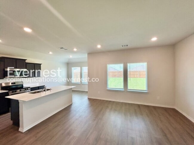 Photo - Modern Living with Fenced Yard and Garage Access / 3 Bed & 2 Bath / Available Now!