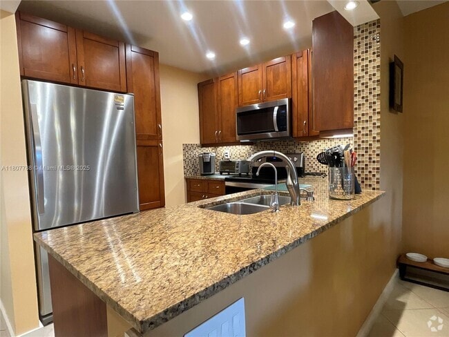 Building Photo - 4161 NW 90th Ave Unit 207 Rental