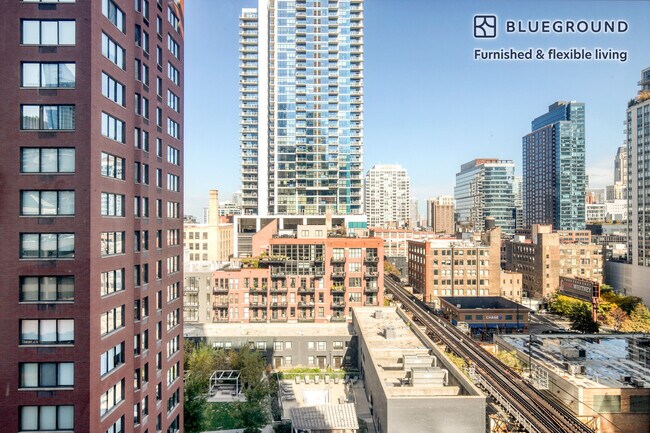 Photo - 311 W Illinois St Unidad FL9-ID819