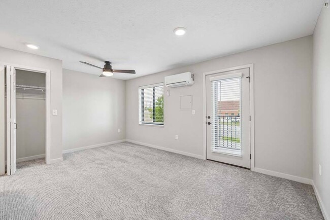 Natural light, an open layout, and direct balcony access create a bright and inviting space designed for comfortable everyday living.