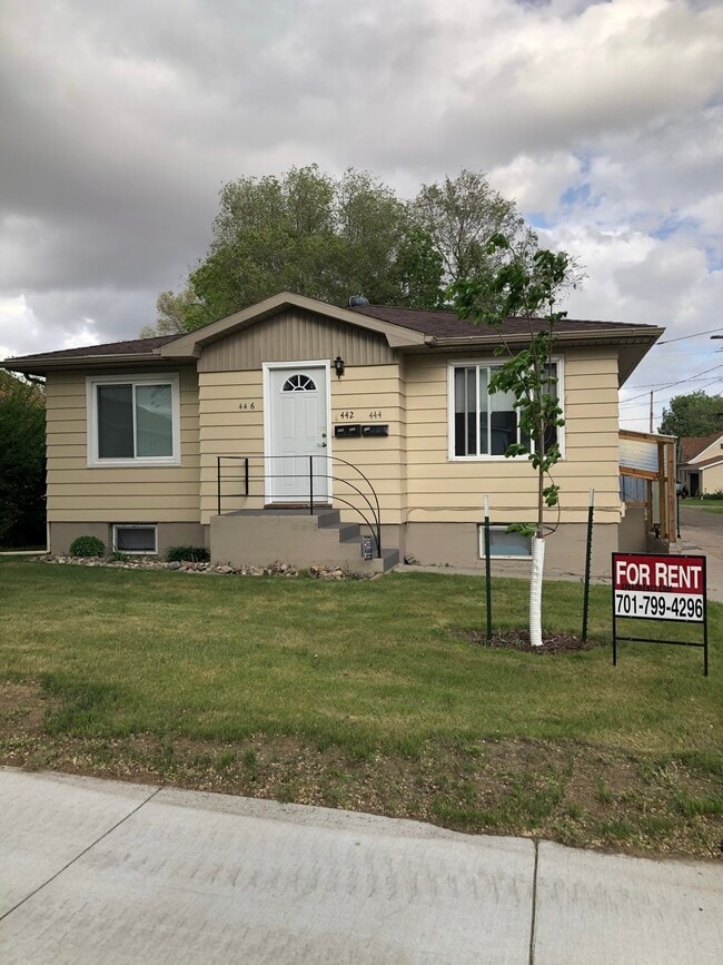Front of 3 plex, unit is on left - 446 5th Ave NW