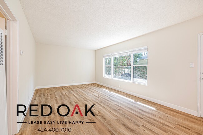 Photo - With Modern Finishes, the Unit Provides a ... Unit 2