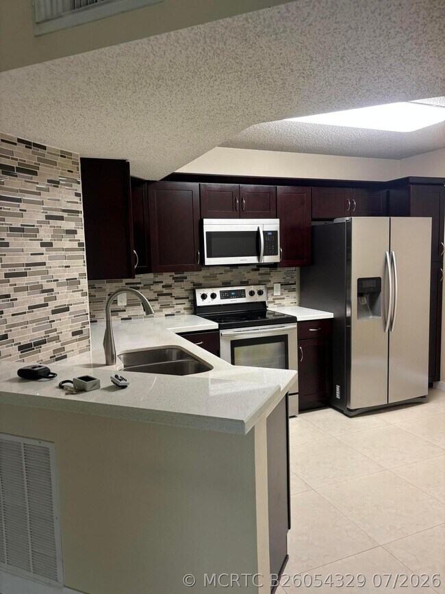8761 Wiles Rd Unit 304