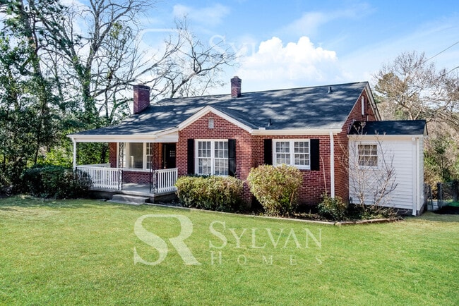 Photo - The living is easy in this 3 bedroom, 2 bathroom brick home