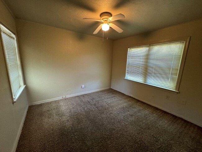 Photo - Mowing Included!  Lots of character, wood vinyl flooring and carpet, large, fenced yard, ready fo...