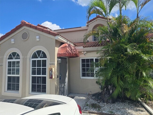 Building Photo - 6886 NW 166th Terrace Unit 1004