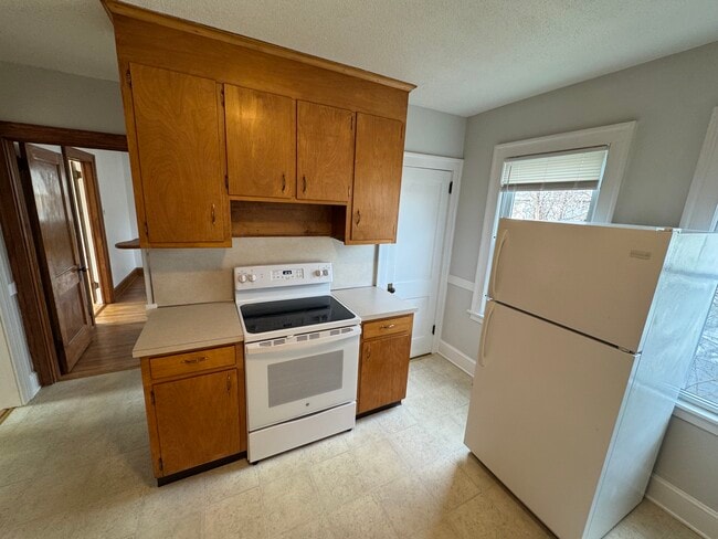 Kitchen with storage closet - 34 Nesbit Ave Unit 3