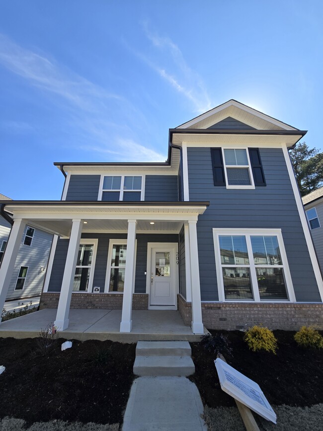 Rocking style front porch - 209 Ribbon Rail St House