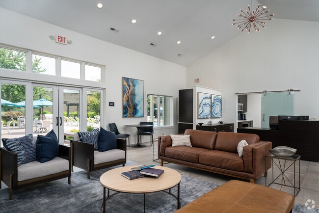 Resident Clubhouse with HDTVs & Gathering Space - The Coleman Canal Winchester Rental