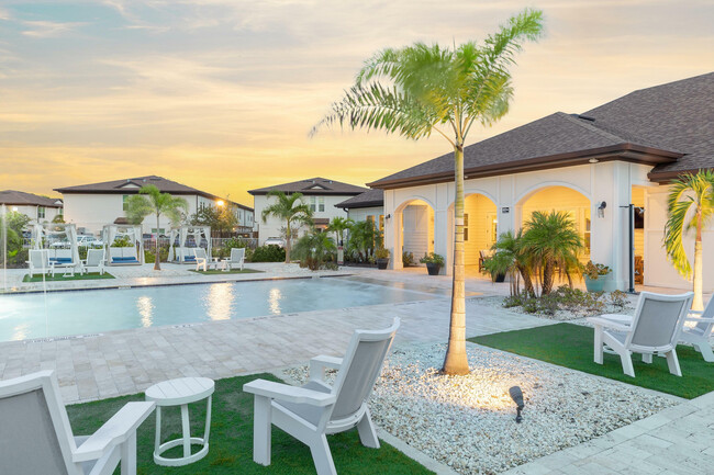 Unwind in this luxurious outdoor setting, perfect for relaxation and leisure. - Cortona South Tampa Apartments