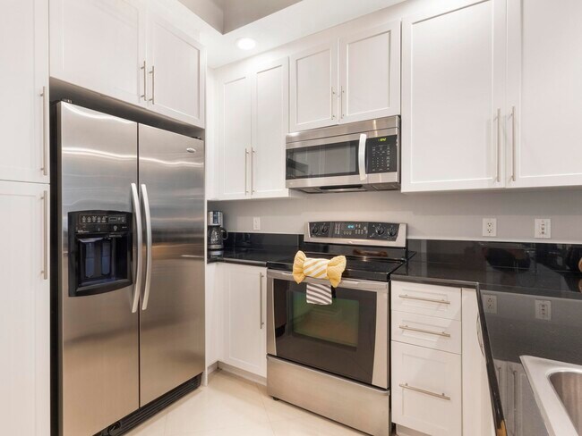 Building Photo - 701 S Olive Ave Unit 908 Rental