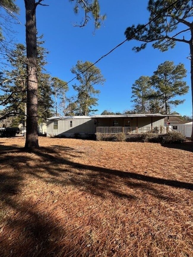 Photo - Welcome to this charming 2-bedroom, 1.5-bathroom home located in the desirable area of Leland, NC