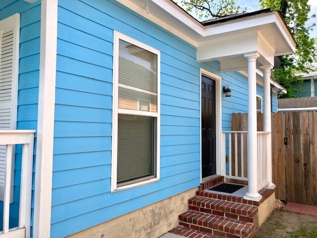 Side Entrance leads to Driveway - 1223 E Waldburg St