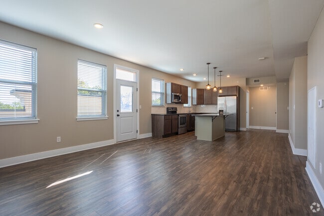 4BR, 2BA - 1,320SF - Living Room - Trowbridge Flats