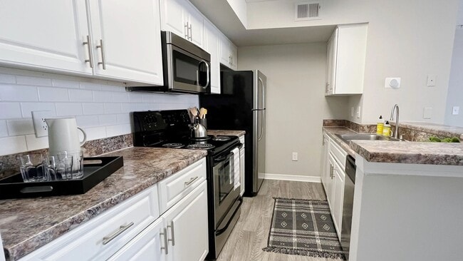Our galley-style kitchens offer abundant cabinet space.