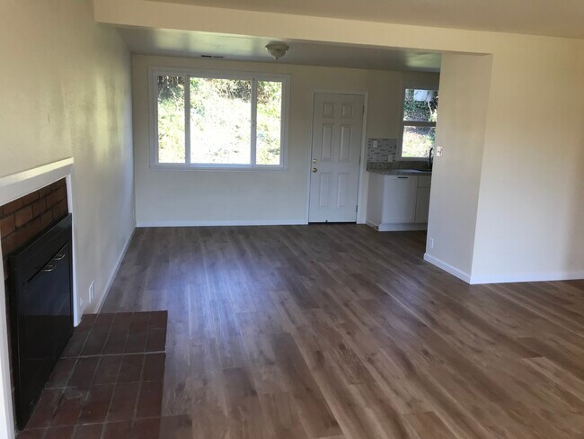 Dining area with backyard access.