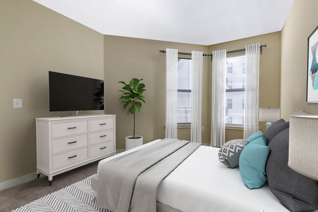 Upgraded bedroom with carpet