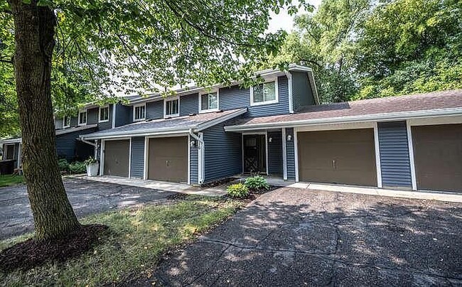 2 Garages one on either side of front door - 4116 Cj Cir SE Townhome