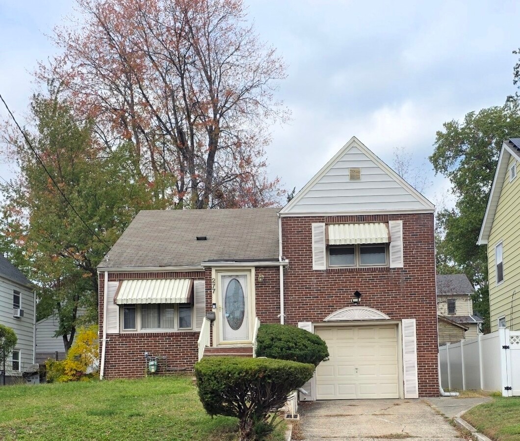 Front of home with attached garage - 277 Bernard Ter